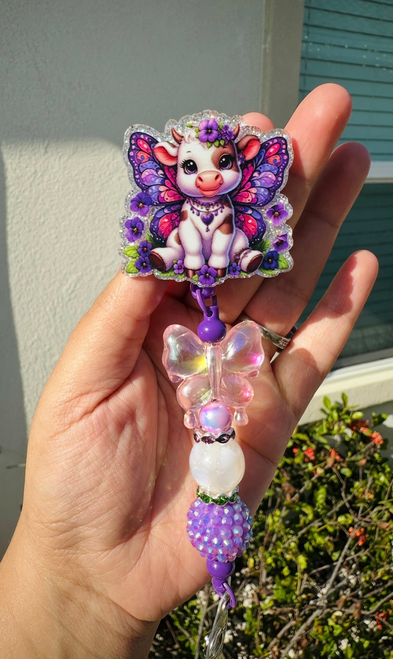 Purple Butterfly Cow Badge Reel