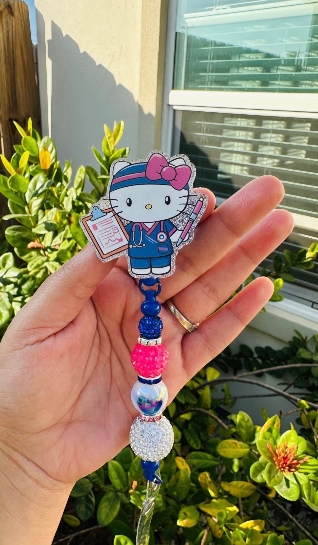 HK Blue Scrubs Badge Reel