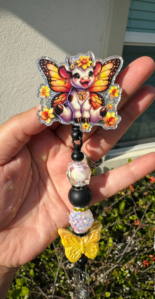 Yellow Butterfly Cow Badge Reel